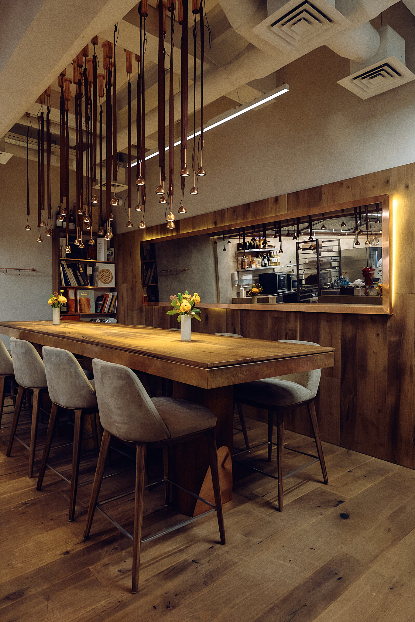 communal table with framed kitchen view